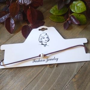 Cultured pearl suede leatherette choker necklace.